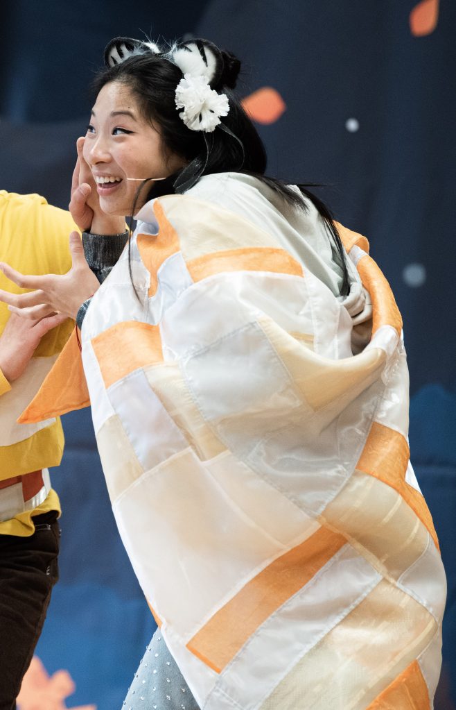 adele, listening while in tiger costume